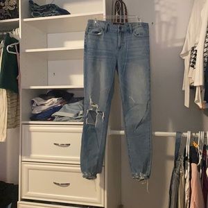 Lucky Brand jeans, size 6/28, light wash, ripped, one black pocket